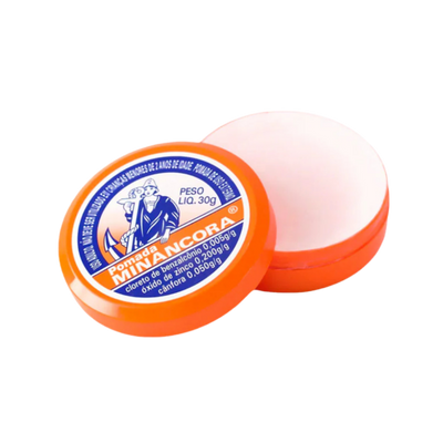 An open jar of Mirancora hand cream, showing the bright orange container and the pale pink cream inside, with the branded lid resting in front on a plain white background.
