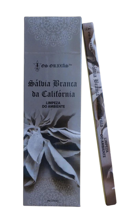 A bundle of white sage incense with a decorative label that includes floral and spiritual-themed text.