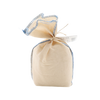 Beige drawstring bag with blue trim on a white background