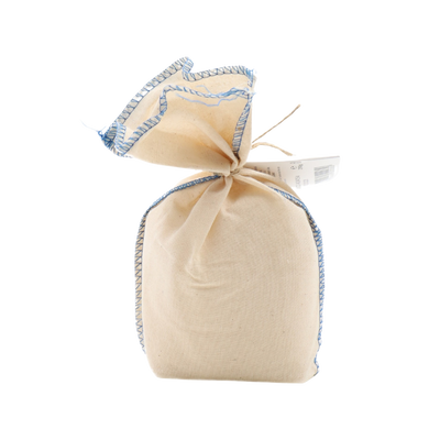 Beige drawstring bag with blue trim on a white background