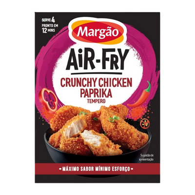 Margão Air-Fry Crunchy Chicken Paprika seasoning packet with chicken pieces on a black background