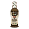 Barbecue sauce bottle with a label featuring a man's face on a white background