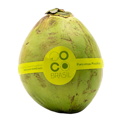 Green coconut with a yellow 'Coco Brasil' label on a white background