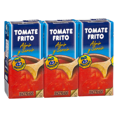 Three boxes of Tomate Frito with a wooden spoon illustration on a white background
