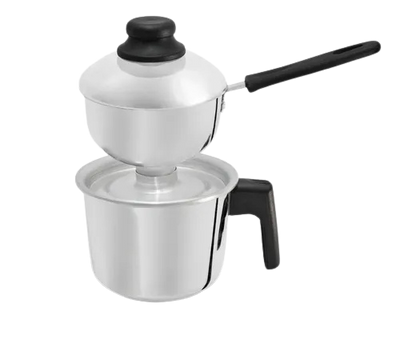 Stainless steel double boiler with black handles on a white background