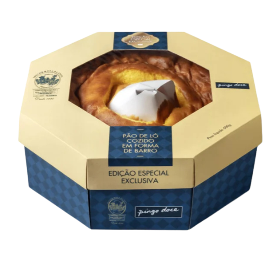 Hexagonal cake packaging with a cake inside on a white background