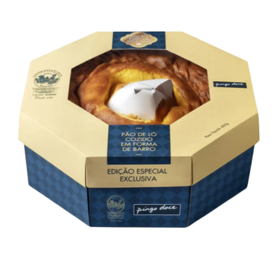 Hexagonal cake packaging with a cake inside on a white background