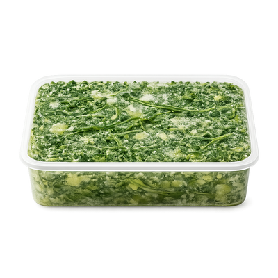 Frozen green vegetable mix in a clear plastic container on a white background