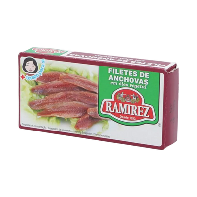 Packaging of Ramirez anchovy fillets in oil showing the brand logo, anchovies on lettuce, and product details.